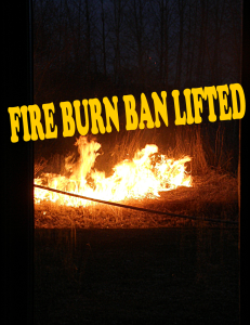 Photo of a fire with Fire Ban Lifted message
